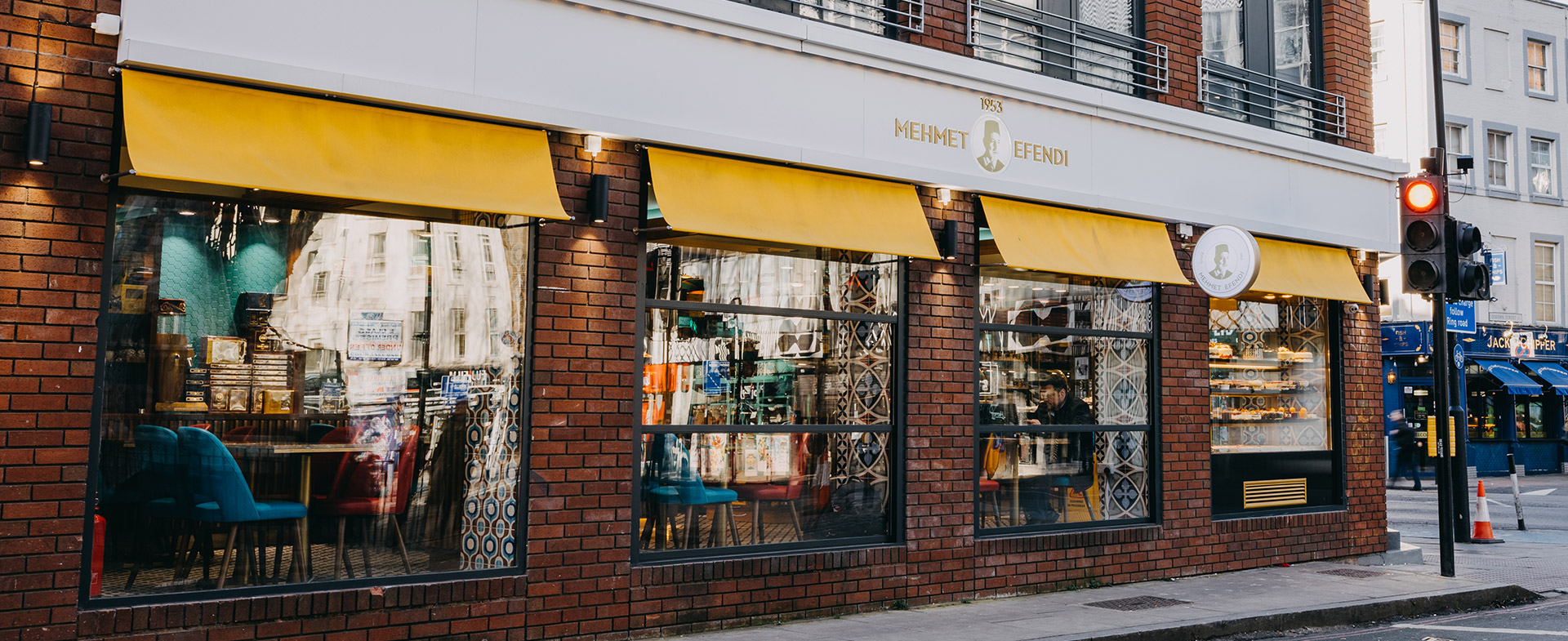 Mehmet Efendi 1953 Whitechapel shopfront with yellow awnings